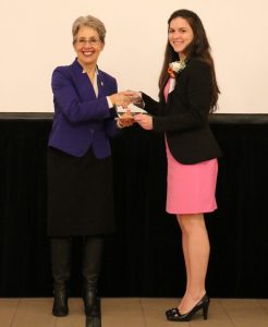 Photo of scholarship presentation to Elena Montoto